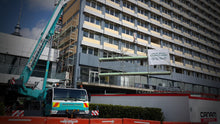 Load image into Gallery viewer, Scaffold being craned into position on Copthorne Refurbishment