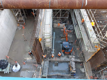 Load image into Gallery viewer, Layher Allround Scaffolding built by North Shore Scaffolding underneath Lower Queen Street, between Central Post Office (Britomart Station) and H&amp;M, as part of the City Rail Link (CRL).
