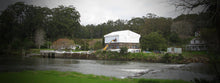 Load image into Gallery viewer, Keder Roof on the Old Stone Store in Kerikeri, Northland. Work done by North Shore Scaffolding on this old heritage building
