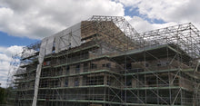 Load image into Gallery viewer, keder roof having roof sheets installed.
