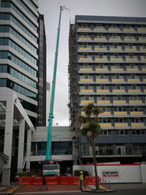 Load image into Gallery viewer, Scaffolding being craned into position for Copthorne refurbishment
